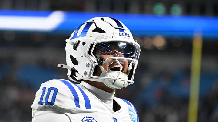 Former Duke Blue Devils quarterback Darian Mensah (10) celebrates.
