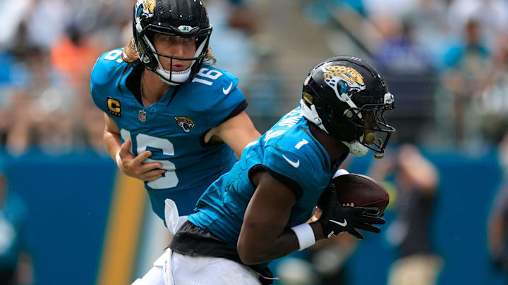 Jacksonville Jaguars quarterback Trevor Lawrence (16) hands off to Jacksonville Jaguars running back Travis Etienne Jr. (1) during the second quarter of an NFL football matchup at EverBank Stadium, Sunday, Sept. 7, 2025 in Jacksonville, Fla. [Corey Perrine/Florida Times-Union]