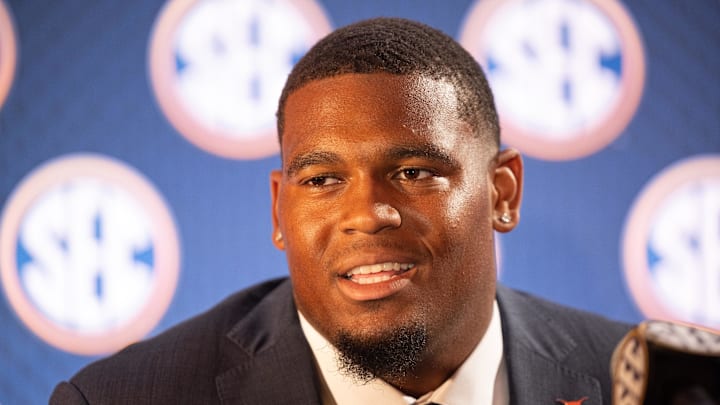 Jul 17, 2024; Dallas, TX, USA; Texas offensive lineman Kelvin Banks Jr. speaking at Omni Dallas Hotel. Mandatory Credit: Brett Patzke-Imagn Images Jul 17, 2024; Dallas, TX, USA; Texas offensive lineman Kelvin Banks Jr. speaking at Omni Dallas Hotel. Mandatory Credit: Brett Patzke-Imagn Images