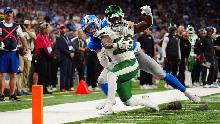 Detroit Lions linebacker Trevor Nowaske (53) makes a tackle to stop a touchdown by New York Jets running back Breece Hall (20) during the second half of the NFL game at Ford Field in Detroit, Sunday, Sept. 27, 2026.