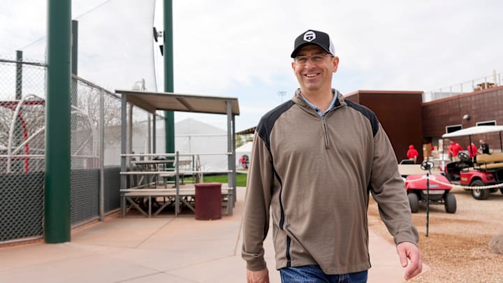 Reds president of baseball operations Nick Krall walks between fields at the Cincinnati Reds Player Development Complex in Goodyear, Ariz., on Wednesday, Feb. 12, 2025. Reds president of baseball operations Nick Krall walks between fields at the Cincinnati Reds Player Development Complex in Goodyear, Ariz., on Wednesday, Feb. 12, 2025.