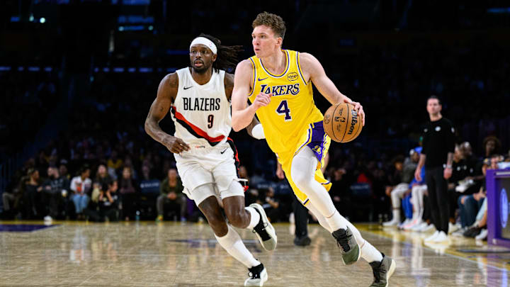 Oct 27, 2025; Los Angeles, California, USA; Los Angeles Lakers forward Dalton Knecht (4) drives the ball during the second half against the Portland Trail Blazers at Crypto.com Arena. Mandatory Credit: William Liang-Imagn Images Oct 27, 2025; Los Angeles, California, USA; Los Angeles Lakers forward Dalton Knecht (4) drives the ball during the second half against the Portland Trail Blazers at Crypto.com Arena. Mandatory Credit: William Liang-Imagn Images