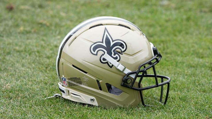 Aug 14, 2025; Carson, CA, USA; A New Orleans Saints helmet on the field during a joint practice against the Los Angeles Rams at the Dignity Health Sports Park. Mandatory Credit: Kirby Lee-Imagn Images Aug 14, 2025; Carson, CA, USA; A New Orleans Saints helmet on the field during a joint practice against the Los Angeles Rams at the Dignity Health Sports Park. Mandatory Credit: Kirby Lee-Imagn Images
