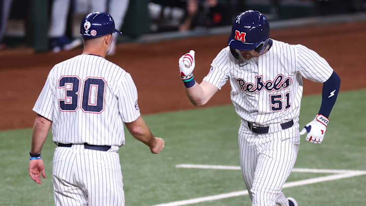 Ole Miss outfielder Isaac Humphrey rounds the bases after hitting a solo home run in a 2-1 win over the Arizona Wildcats at Globe Life Field in Arlington, Texas.