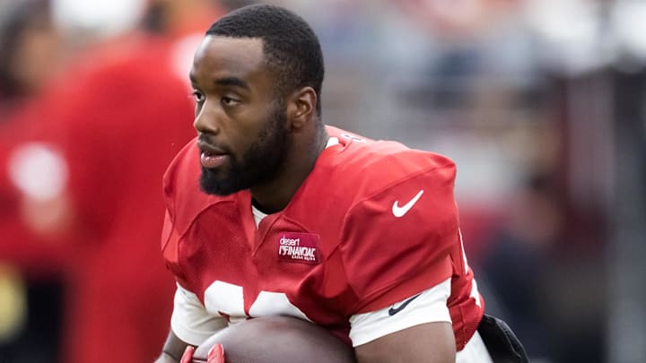 Aug 2, 2025; Glendale, AZ, USA; Arizona Cardinals running back Trey Benson (33) during the Red and White practice in training camp at State Farm Stadium. Mandatory Credit: Mark J. Rebilas-Imagn Images