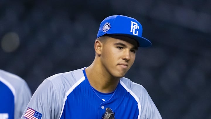 Aug 28, 2022; Phoenix, Arizona, US; East infielder Daniel Cuvet (15) during the Perfect Game All-American Classic high school baseball game at Chase Field. Mandatory Credit: Mark J. Rebilas-Imagn Images Aug 28, 2022; Phoenix, Arizona, US; East infielder Daniel Cuvet (15) during the Perfect Game All-American Classic high school baseball game at Chase Field. Mandatory Credit: Mark J. Rebilas-Imagn Images