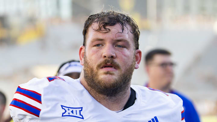 Oct 5, 2024; Tempe, Arizona, USA; Kansas Jayhawks offensive lineman Bryce Foster (61) against the Arizona State Sun Devils at Mountain America Stadium. Mandatory Credit: Mark J. Rebilas-Imagn Images