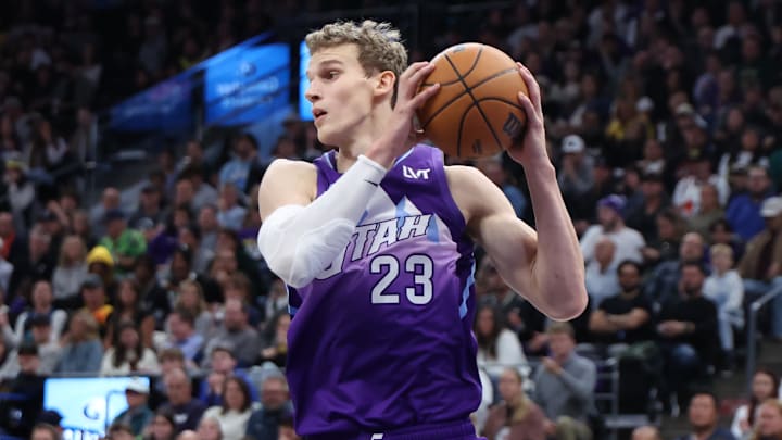 Nov 14, 2024; Salt Lake City, Utah, USA; Utah Jazz forward Lauri Markkanen (23) rebounds the ball against the Dallas Mavericks during the fourth quarter at Delta Center. Mandatory Credit: Rob Gray-Imagn Images