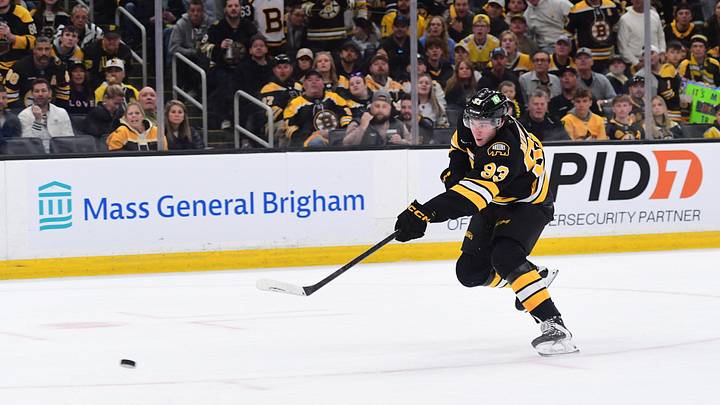 Apr 26, 2026; Boston, Massachusetts, USA; Boston Bruins center Fraser Minten (93) shoots the puck during the first period in game four of the first round of the 2026 Stanley Cup Playoffs against the Buffalo Sabres at TD Garden. Mandatory Credit: Bob DeChiara-Imagn Images