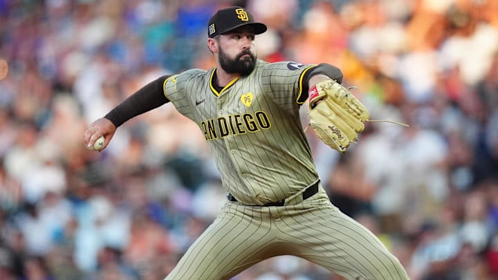 Aug 16, 2024; Denver, Colorado, USA; San Diego Padres starting pitcher Matt Waldron (61) delivers a pitch in the fourth inning against the Colorado Rockies at Coors Field. Mandatory Credit: Ron Chenoy-Imagn Images