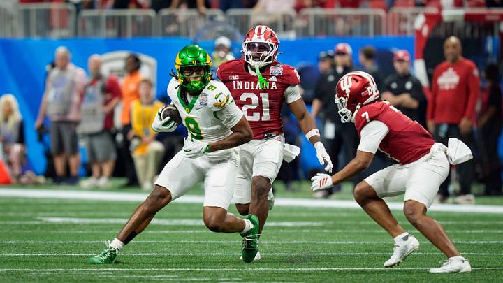 Oregon tight end Jamari Johnson carries the ball after a catch as the Oregon Ducks face the Indiana Hoosiers in the Peach Bowl on Jan. 9, 2026, at Mercedes-Benz Stadium in Atlanta, Georgia.