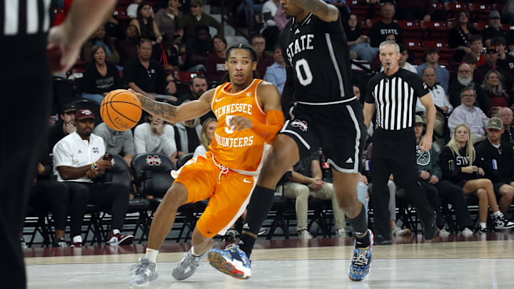 Jan 17, 2023; Starkville, Mississippi, USA; Tennessee Volunteers guard Zakai Zeigler (5) dribbles as