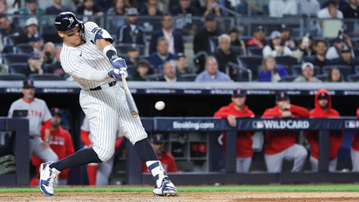 Oct 1, 2025; Bronx, New York, USA; New York Yankees right fielder Aaron Judge (99) hits an hits an RBI single during the fifth inning against the Boston Red Sox during game two of the Wildcard round for the 2025 MLB playoffs at Yankee Stadium. Mandatory Credit: Brad Penner-Imagn Images Oct 1, 2025; Bronx, New York, USA; New York Yankees right fielder Aaron Judge (99) hits an hits an RBI single during the fifth inning against the Boston Red Sox during game two of the Wildcard round for the 2025 MLB playoffs at Yankee Stadium. Mandatory Credit: Brad Penner-Imagn Images