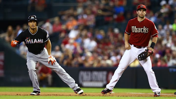 Jun. 19, 2013; Phoenix, AZ, USA: Miami Marlins outfielder Giancarlo Stanton (left) alongside Arizona Diamondbacks first baseman Paul Goldschmidt at Chase Field.
