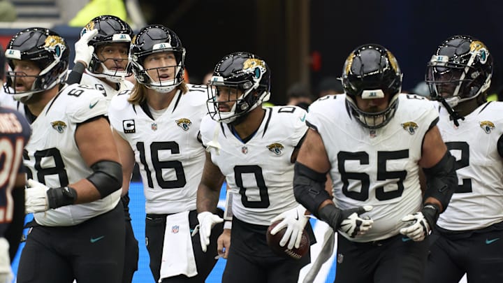 Oct 13, 2024; London, United Kingdom; Jacksonville Jaguars quarterback Trevor Lawrence (16) and 	Jacksonville Jaguars wide receiver Gabe Davis (0) and team mates celebrate a touchdown during the second half of an NFL International Series game at Tottenham Hotspur Stadium. Mandatory Credit: Peter van den Berg-Imagn Images