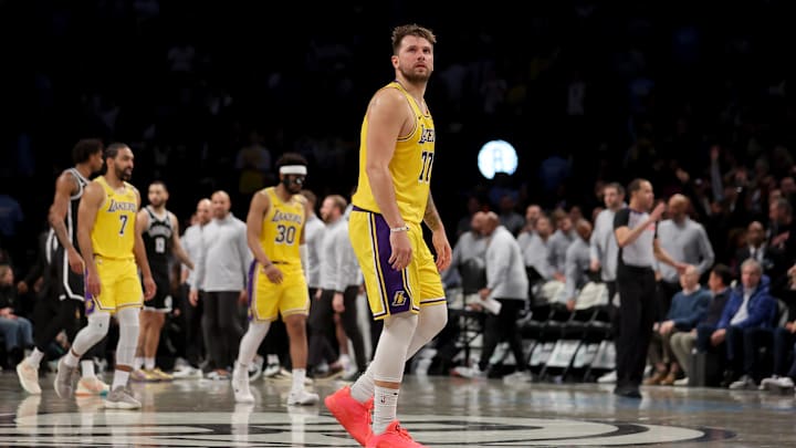 Mar 10, 2025; Brooklyn, New York, USA; Los Angeles Lakers guard Luka Doncic (77) reacts during the fourth quarter against the Brooklyn Nets at Barclays Center. Mandatory Credit: Brad Penner-Imagn Images