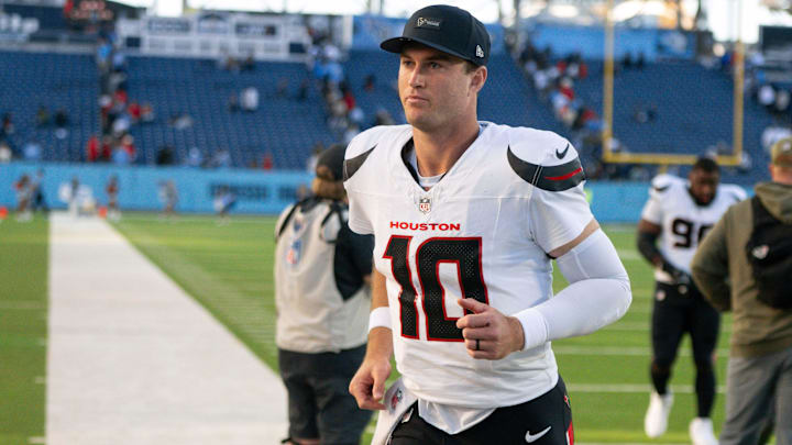 Houston Texans quarterback Davis Mills (10) runs off the field after the win against the Tennessee Titans during the second half at Nissan Stadium. Houston Texans quarterback Davis Mills (10) runs off the field after the win against the Tennessee Titans during the second half at Nissan Stadium.
