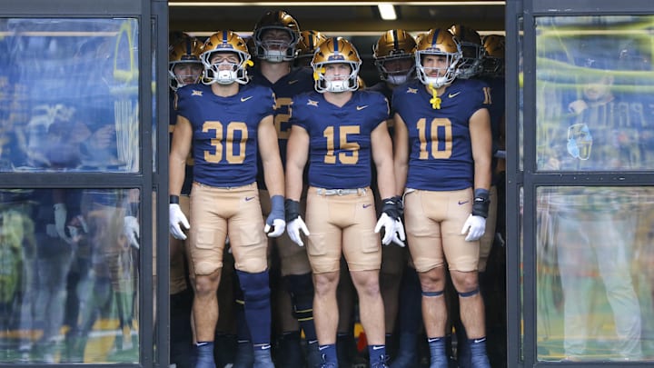 Sep 27, 2025; Morgantown, West Virginia, USA; West Virginia Mountaineers players wait to run onto the field before their game against the Utah Utes at Milan Puskar Stadium. Mandatory Credit: Ben Queen-Imagn Images