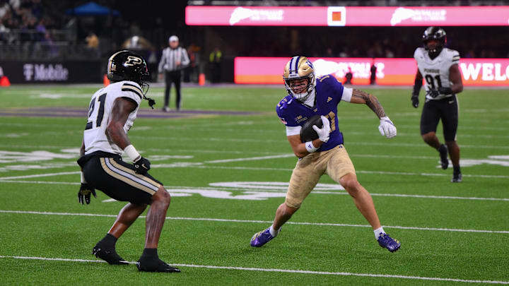 Huskies wide receiver Audric Harris (13)  had 29 and 61 yard catches against Purdue. 