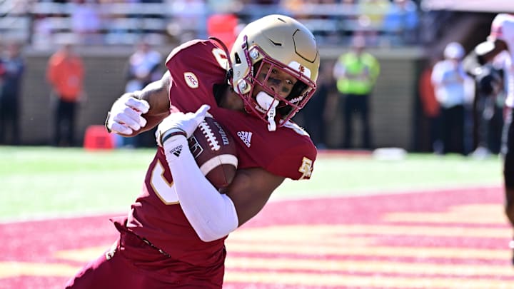 Sep 28, 2024; Chestnut Hill, Massachusetts, USA; Boston College Eagles wide receiver Jerand Bradley (9) makes a catch in the end zone for a touchdown against the Western Kentucky Hilltoppers during the second half at Alumni Stadium. Mandatory Credit: Eric Canha-Imagn Images
