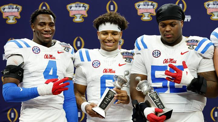 Jan 1, 2026; New Orleans, LA, USA; Mississippi Rebels linebacker Suntarine Perkins (4), quarterback Trinidad Chambliss (6) and defensive tackle Will Echoles (52) pose for a photo after the 2025 Sugar Bowl and quarterfinal game of the College Football Playoff against the Georgia Bulldogs at Caesars Superdome. Mandatory Credit: Amber Searls-Imagn Images Jan 1, 2026; New Orleans, LA, USA; Mississippi Rebels linebacker Suntarine Perkins (4), quarterback Trinidad Chambliss (6) and defensive tackle Will Echoles (52) pose for a photo after the 2025 Sugar Bowl and quarterfinal game of the College Football Playoff against the Georgia Bulldogs at Caesars Superdome. Mandatory Credit: Amber Searls-Imagn Images