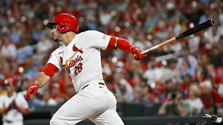 Sep 16, 2024; St. Louis, Missouri, USA;  St. Louis Cardinals third baseman Nolan Arenado (28) hits a one run single against the Pittsburgh Pirates during the fourth inning at Busch Stadium. Mandatory Credit: Jeff Curry-Imagn Images