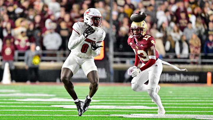 Oct 25, 2024; Chestnut Hill, Massachusetts, USA; Louisville Cardinals wide receiver Chris Bell (0) makes a catch against the Boston College Eagles during the first half at Alumni Stadium. Mandatory Credit: Eric Canha-Imagn Images