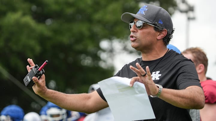 New Kentucky offensive coordinator Bush Hamdan coaches during practice Friday. August 2, 2024 in Lexington. Hamdan came from Boise State; he's also coached at Missouri, the Atlanta Falcons and Florida as well.
