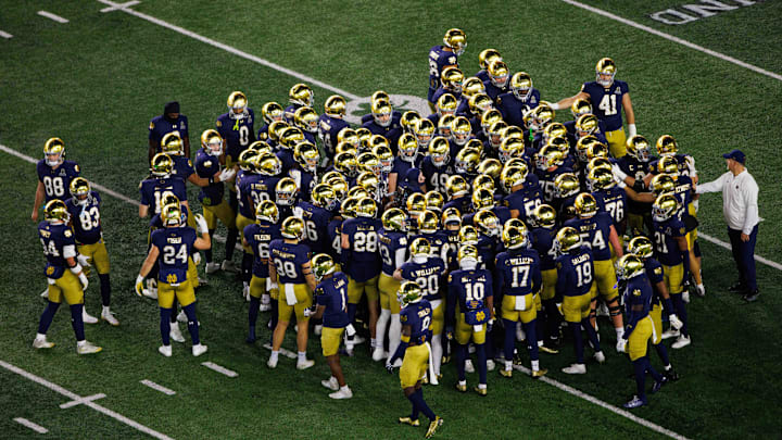 Notre Dame huddles up before the first round of the College Football Playoff between Notre Dame and Indiana at Notre Dame Stadium on Friday, Dec. 20, 2024, in South Bend. Notre Dame huddles up before the first round of the College Football Playoff between Notre Dame and Indiana at Notre Dame Stadium on Friday, Dec. 20, 2024, in South Bend.