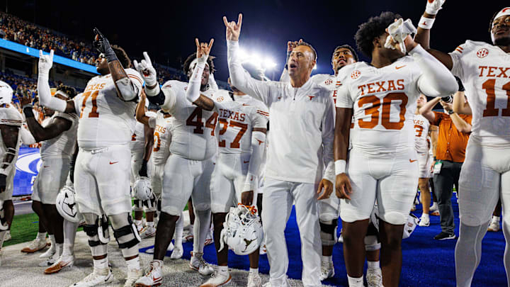 Texas Longhorns head coach Steve Sarkisian celebrates with his team after winning the game against the Kentucky Wildcats at Kroger Field. 