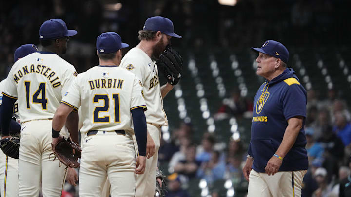 Aug 25, 2025; Milwaukee, Wisconsin, USA; Milwaukee Brewers manager Pat Murphy (right) talks with pitcher Brandon Woodruff (53) during the sixth inning against the Arizona Diamondbacks at American Family Field. Mandatory Credit: Michael McLoone-Imagn Images