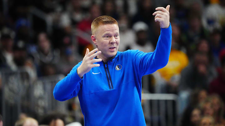 Nov 3, 2023; Denver, Colorado, USA; Dallas Mavericks assistant coach Sean Sweeney calls out in the second half against the Denver Nuggets at Ball Arena. Mandatory Credit: Ron Chenoy-Imagn Images Nov 3, 2023; Denver, Colorado, USA; Dallas Mavericks assistant coach Sean Sweeney calls out in the second half against the Denver Nuggets at Ball Arena. Mandatory Credit: Ron Chenoy-Imagn Images