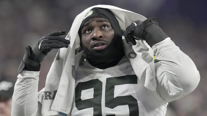 Dec 29, 2024; Minneapolis, Minnesota, USA; Green Bay Packers defensive tackle Devonte Wyatt (95) heads to the locker room during the third quarter against the Minnesota Vikings at U.S. Bank Stadium. Mandatory Credit: Mark Hoffman/USA TODAY NETWORK-Wisconsin via Imagn Images
