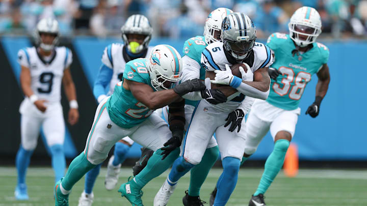 Carolina Panthers running back Rico Dowdle (5) carries the ball during the second quarter against the Miami Dolphins at Bank of America Stadium. Carolina Panthers running back Rico Dowdle (5) carries the ball during the second quarter against the Miami Dolphins at Bank of America Stadium.