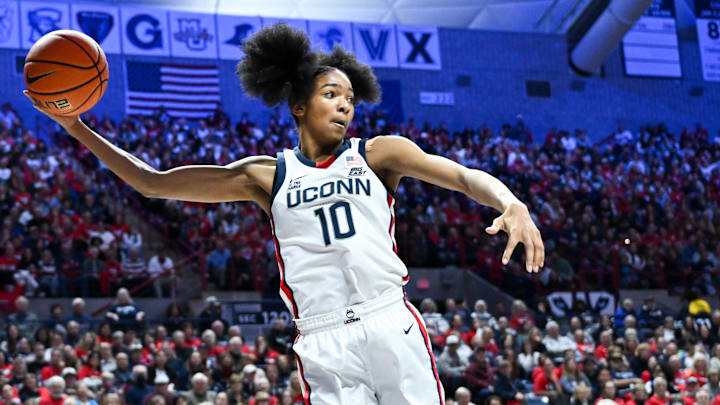 Nov 20, 2024; Storrs, Connecticut, USA; Connecticut Huskies guard Qadence Samuels (10) leaps to keep the ball inbounds during the second half against the Fairleigh Dickinson Knights at Harry A. Gampel Pavilion. Mandatory Credit: Mark Smith-Imagn Images Nov 20, 2024; Storrs, Connecticut, USA; Connecticut Huskies guard Qadence Samuels (10) leaps to keep the ball inbounds during the second half against the Fairleigh Dickinson Knights at Harry A. Gampel Pavilion. Mandatory Credit: Mark Smith-Imagn Images