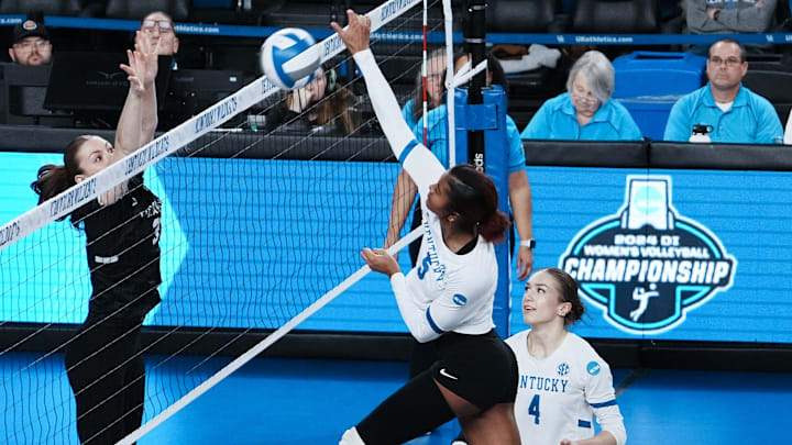 Kentucky's Jordyn Dailey (5) spiked against Cleveland State during the NCAA Women's Volleyball Tournament at Memorial Coliseum in Lexington, Ky. on Dec. 5, 2024.