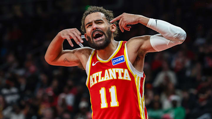 Dec 23, 2025; Atlanta, Georgia, USA; Atlanta Hawks guard Trae Young (11) yells at the referee during the game against the Chicago Bulls during the third quarter at State Farm Arena. Mandatory Credit: Jordan Godfree-Imagn Images