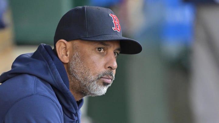 Apr 6, 2024; Anaheim, California, USA; Boston Red Sox manager Alex Cora (13) sits in the dugout