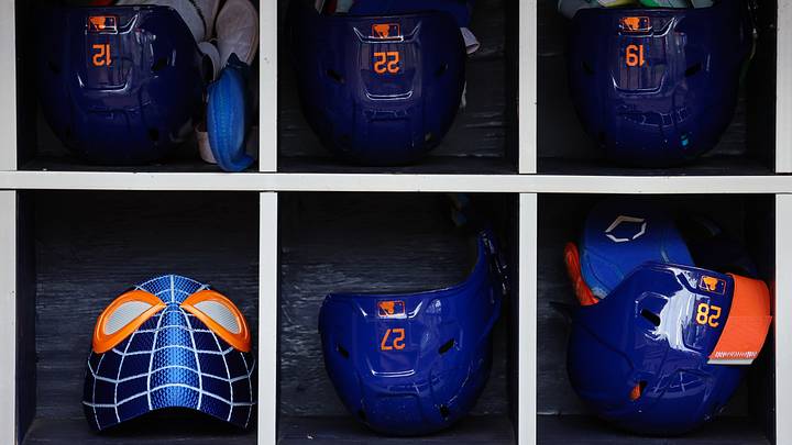 Jul 4, 2026; Cumberland, Georgia, USA; A detailed view of helmets of the New York Mets in the dugout during batting practice before a game against the Atlanta Braves at Truist Park. Mandatory Credit: Colin Hubbard-Imagn Images Jul 4, 2026; Cumberland, Georgia, USA; A detailed view of helmets of the New York Mets in the dugout during batting practice before a game against the Atlanta Braves at Truist Park. Mandatory Credit: Colin Hubbard-Imagn Images