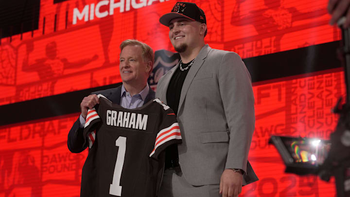 Mason Graham, DT, Michigan poses with NFL Commissioner Roger Goodell after being selected 5th overall by the Cleveland Browns during the first round of the 2025 NFL Draft at Lambeau Field on April 24, 2025 in Green Bay, Wisconsin. Mason Graham, DT, Michigan poses with NFL Commissioner Roger Goodell after being selected 5th overall by the Cleveland Browns during the first round of the 2025 NFL Draft at Lambeau Field on April 24, 2025 in Green Bay, Wisconsin.