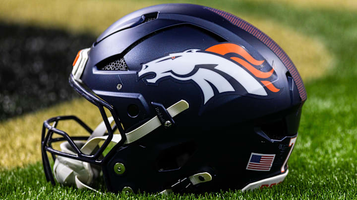Aug 23, 2025; New Orleans, Louisiana, USA; Detailed view of the Denver Broncos helmet against the New Orleans Saints during warmups at Caesars Superdome. 