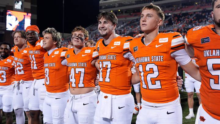 Oklahoma State Cowboys quarterback Drew Mestemaker sings the OSU alma mater with teammates. Oklahoma State Cowboys quarterback Drew Mestemaker sings the OSU alma mater with teammates.