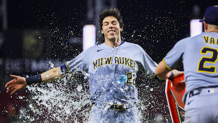 Milwaukee Brewers first baseman Andrew Vaughn dumps water on designated hitter Christian Yelich after the victory over the Cincinnati Reds at Great American Ball Park.
