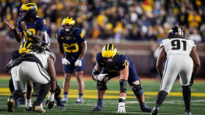 Michigan offensive lineman Blake Frazier (77) gets ready for a play against Purdue during the second half at Michigan Stadium in Ann Arbor on Saturday, November 1, 2025.
