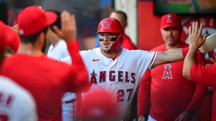 Aug 28, 2026; Anaheim, California, USA; Los Angeles Angels center fielder Mike Trout (27) is greeted after scoring a run against the Philadelphia Phillies during the first inning at Angel Stadium. Mandatory Credit: Gary A. Vasquez-Imagn Images Aug 28, 2026; Anaheim, California, USA; Los Angeles Angels center fielder Mike Trout (27) is greeted after scoring a run against the Philadelphia Phillies during the first inning at Angel Stadium. Mandatory Credit: Gary A. Vasquez-Imagn Images