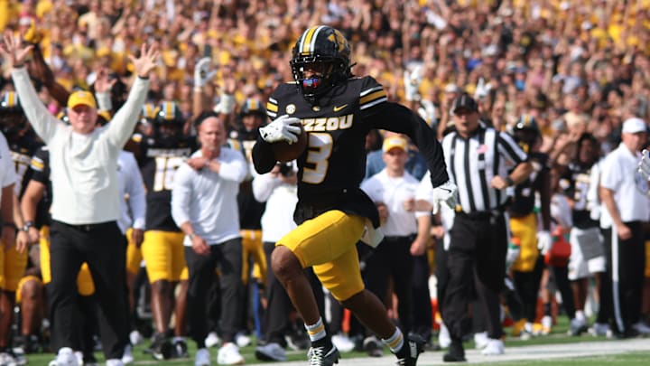 Sep 6, 2025; Columbia, Missouri, USA; Missouri Tigers wide receiver Kevin Coleman (3) catches the ball and runs it to the 2-yard line against the Kansas Jayhawks in the first quarter of the Border War at Faurot Field at Memorial Stadium.