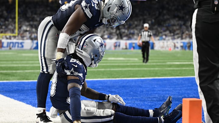 Dallas Cowboys wide receiver CeeDee Lamb is helped by Javonte Williams after being injured against the Detroit Lions Dallas Cowboys wide receiver CeeDee Lamb is helped by Javonte Williams after being injured against the Detroit Lions