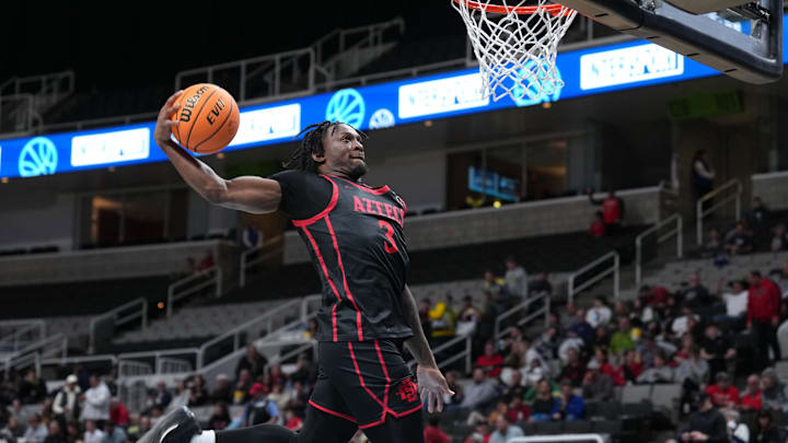 Dec 21, 2024; San Jose, California, USA; San Diego State Aztecs guard Wayne McKinney III (3) warms up before the game against the California Golden Bears at SAP Center. Mandatory Credit: Darren Yamashita-Imagn Images