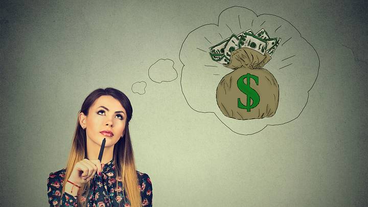 A teacher thinking of financial success A teacher thinking of financial success