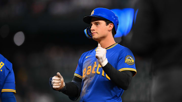 Aug 8, 2025; Seattle, Washington, USA; Seattle Mariners second baseman Cole Young (2) reacts to hitting a single against the Tampa Bay Rays during the eighth inning at T-Mobile Park. Mandatory Credit: Steven Bisig-Imagn Images